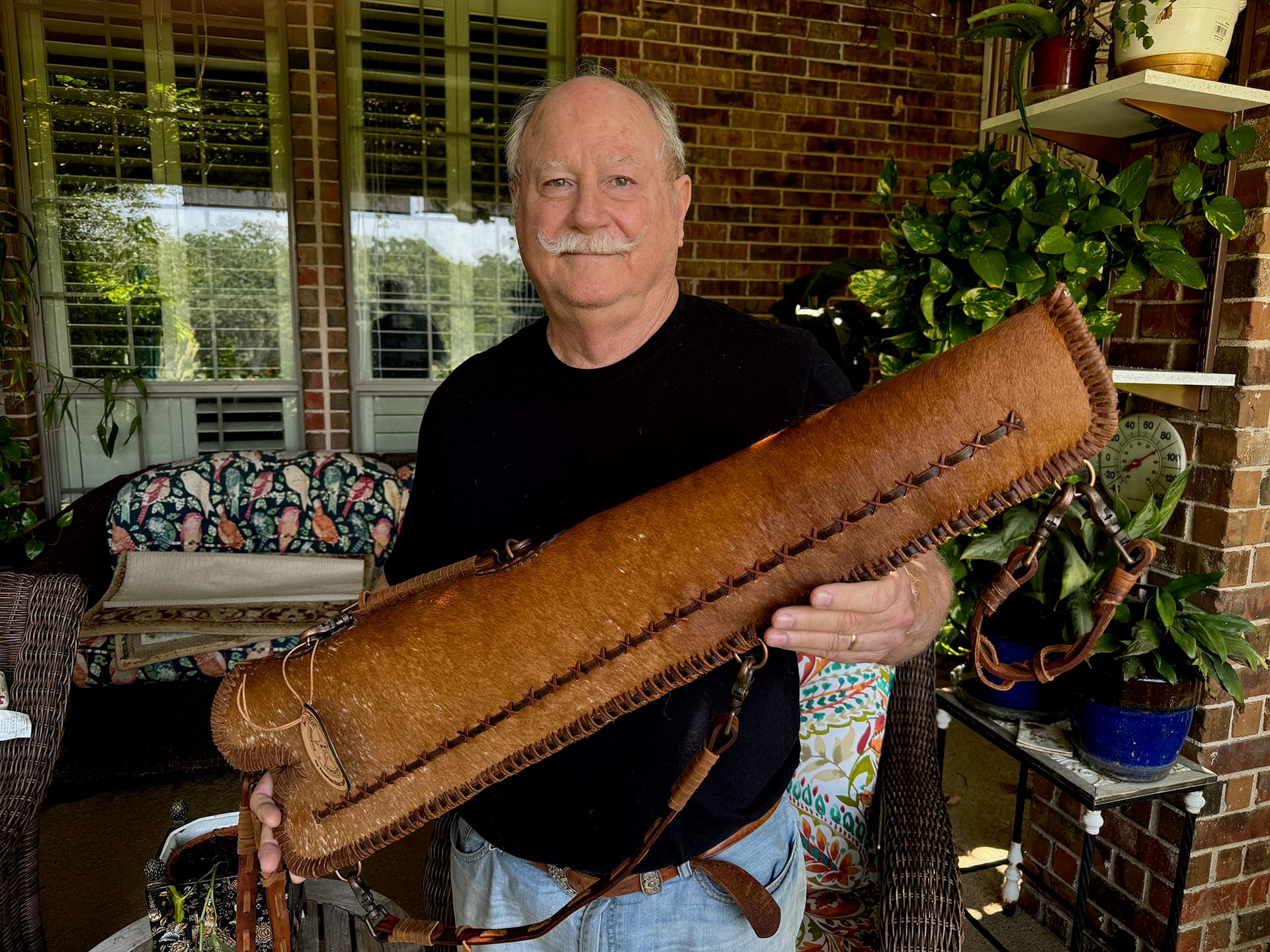 A Longhorn Scabbard Being Held by Larry Paul Meese